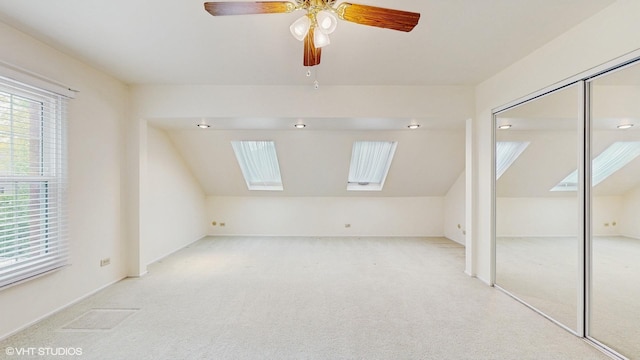 315 Carmelhead Ln, Schaumburg, IL 60193 - bonus room with lofted ceiling, a skylight, carpet, and a ceiling fan