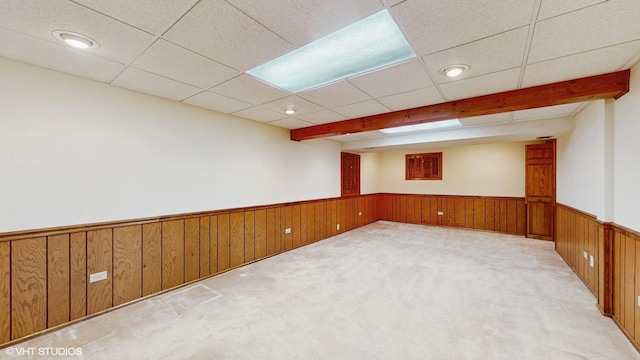 315 Carmelhead Ln, Schaumburg, IL 60193 - spare room with wainscoting, light colored carpet, a drop ceiling, and wooden walls