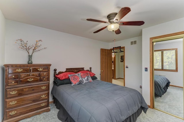 32911 Deer Ridge Dr, Wilmington, IL 60481 - bedroom with light carpet, baseboards, and a ceiling fan