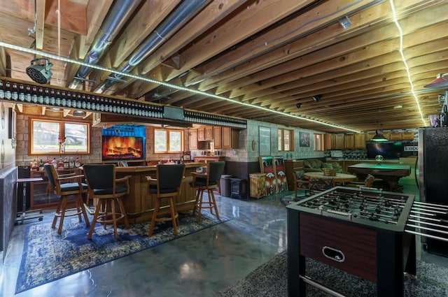 32911 Deer Ridge Dr, Wilmington, IL 60481 - indoor dry bar featuring concrete flooring and freestanding refrigerator