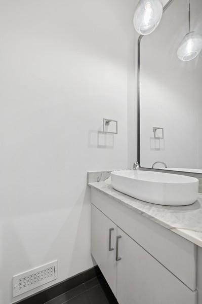 1018 N Honore Ave Unit C, Chicago, IL 60622 - bathroom with vanity and tile patterned floors