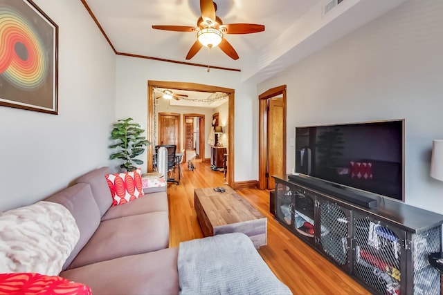 3746 N Hermitage Ave, Chicago, IL 60613 - living area with a ceiling fan, wood finished floors, and ornamental molding