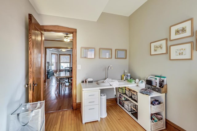 3746 N Hermitage Ave, Chicago, IL 60613 - office area with light wood-style floors and a ceiling fan