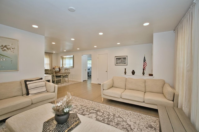 5025 Jerome Ave, Skokie, IL 60077 - living area with light wood finished floors, arched walkways, and recessed lighting