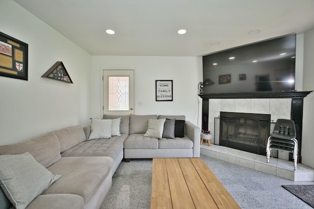 5025 Jerome Ave, Skokie, IL 60077 - carpeted living area featuring a tile fireplace and recessed lighting