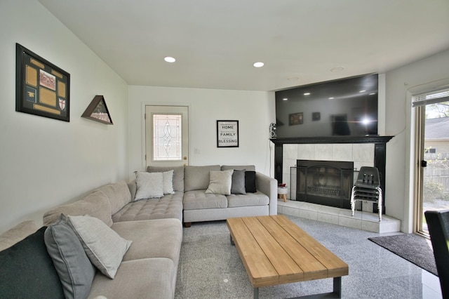 5025 Jerome Ave, Skokie, IL 60077 - living area featuring a tiled fireplace, recessed lighting, and carpet flooring