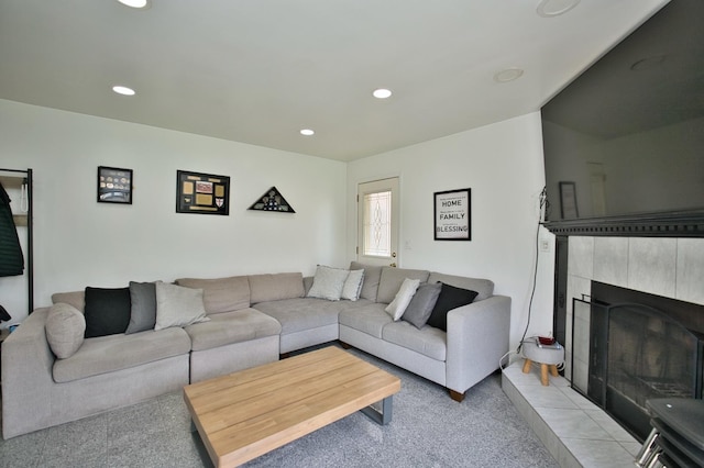 5025 Jerome Ave, Skokie, IL 60077 - living room with light colored carpet, a tile fireplace, and recessed lighting