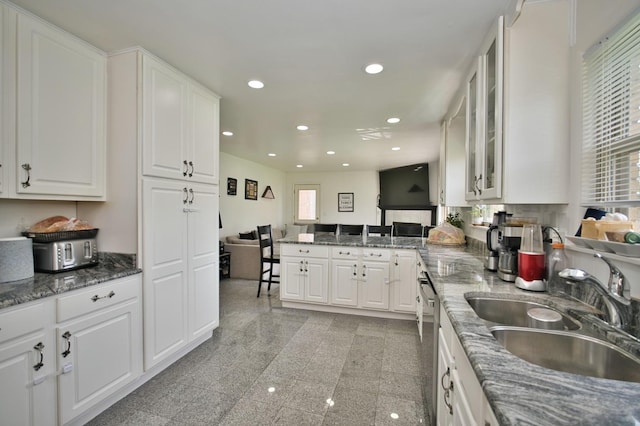 5025 Jerome Ave, Skokie, IL 60077 - kitchen featuring a sink, recessed lighting, healthy amount of natural light, and white cabinets