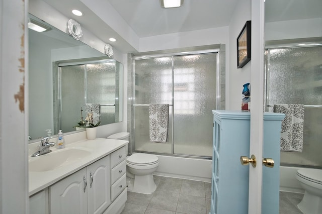 5025 Jerome Ave, Skokie, IL 60077 - full bath with toilet, tile patterned floors, bath / shower combo with glass door, vanity, and recessed lighting