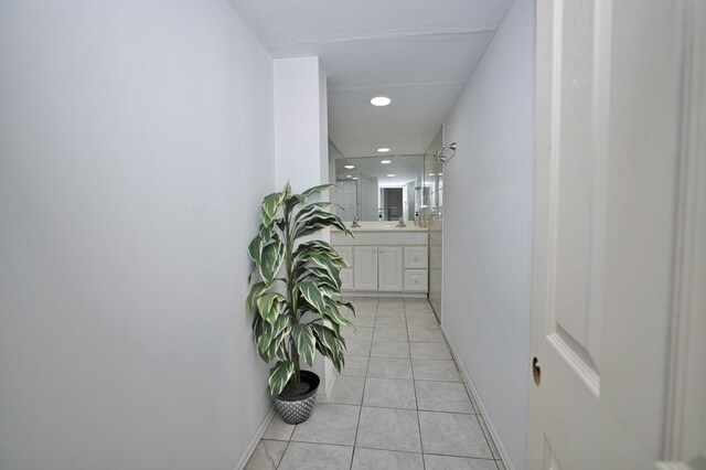 5025 Jerome Ave, Skokie, IL 60077 - hallway with light tile patterned floors, baseboards, and recessed lighting