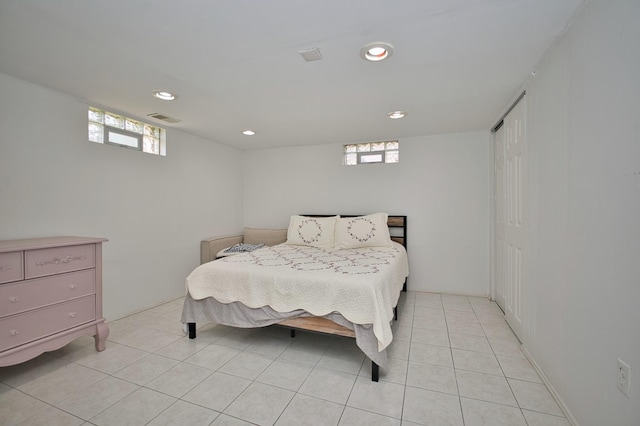5025 Jerome Ave, Skokie, IL 60077 - bedroom with multiple windows, recessed lighting, light tile patterned floors, and a closet