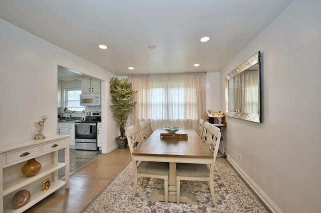 5025 Jerome Ave, Skokie, IL 60077 - dining space with light wood-style flooring, recessed lighting, and baseboards