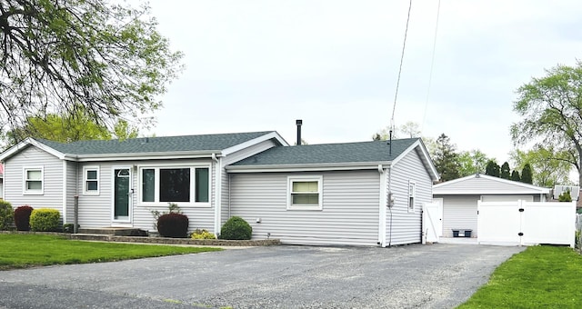 8605 Leclaire Ave, Burbank, IL 60459 - ranch-style house featuring a shingled roof, a front yard, and a gate