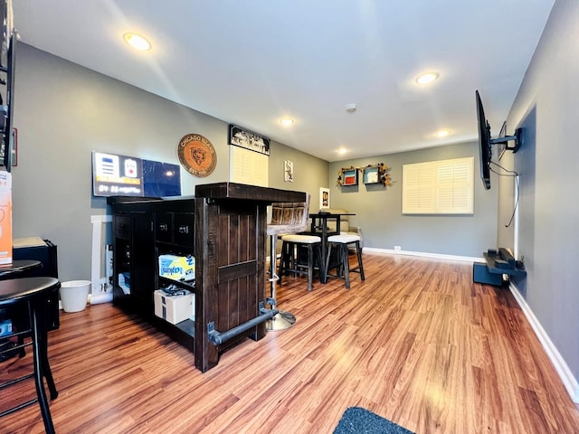 8605 Leclaire Ave, Burbank, IL 60459 - recreation room featuring wood finished floors, baseboards, and recessed lighting