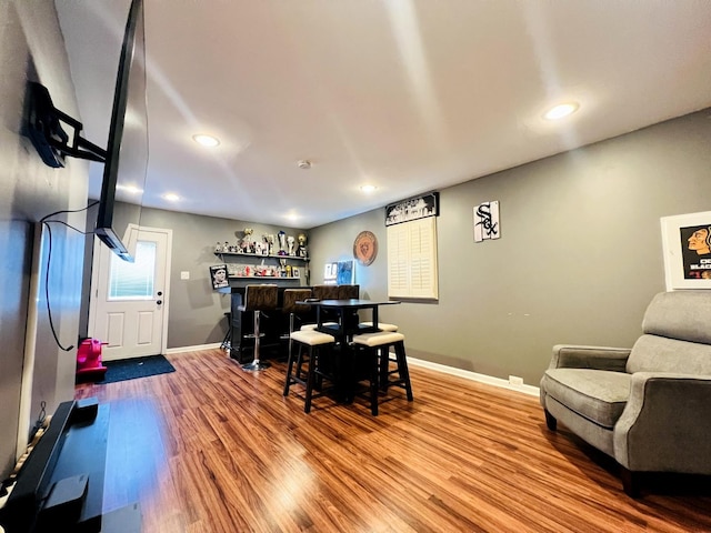 8605 Leclaire Ave, Burbank, IL 60459 - dining room featuring a dry bar, wood finished floors, baseboards, and recessed lighting