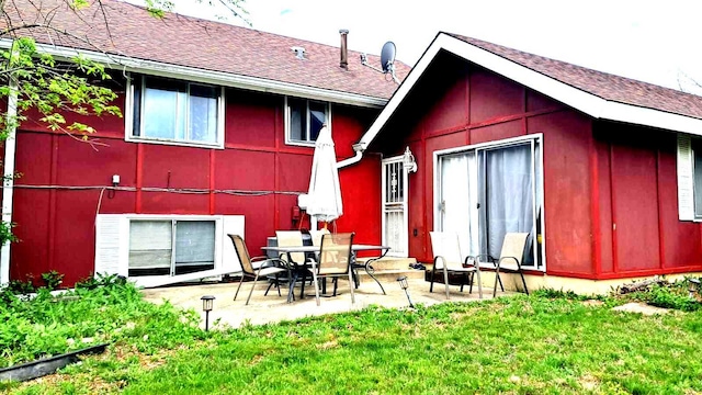 3407 Fountainbleau Dr, Hazel Crest, IL 60429 - rear view of house featuring a patio, a shingled roof, and a yard