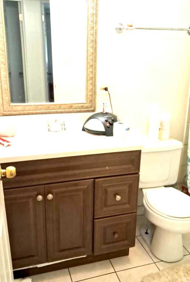 3407 Fountainbleau Dr, Hazel Crest, IL 60429 - bathroom with tile patterned floors, vanity, and toilet