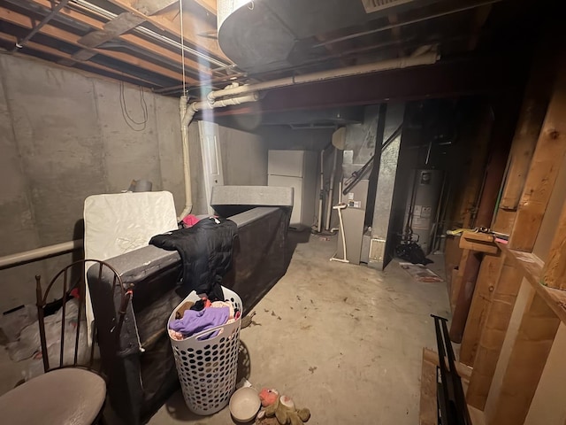 1896 Windsor Ct, Gurnee, IL 60031 - unfinished below grade area featuring gas water heater, freestanding refrigerator, and heating unit