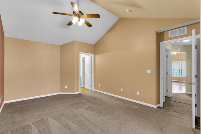 1352 Mariner Way Unit 0, Champaign, IL 61822 - empty room featuring a ceiling fan, lofted ceiling, carpet floors, and baseboards