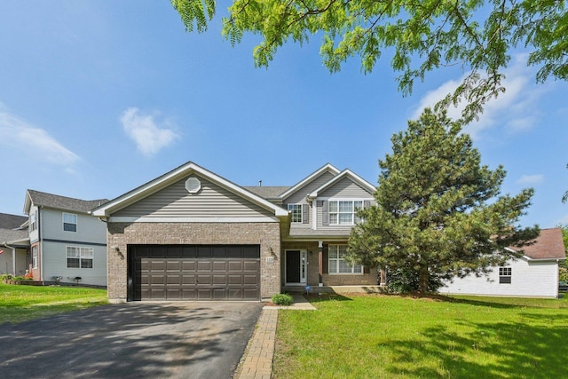 1159 Clover Hill Ln, Elgin, IL 60120 - view of front facade with brick siding, driveway, an attached garage, and a front yard