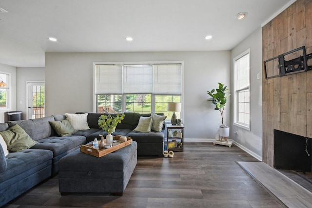 1159 Clover Hill Ln, Elgin, IL 60120 - living area with healthy amount of natural light, recessed lighting, dark wood-style floors, a fireplace, and baseboards