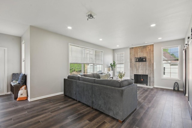 1159 Clover Hill Ln, Elgin, IL 60120 - living area with recessed lighting, dark wood-style floors, and baseboards