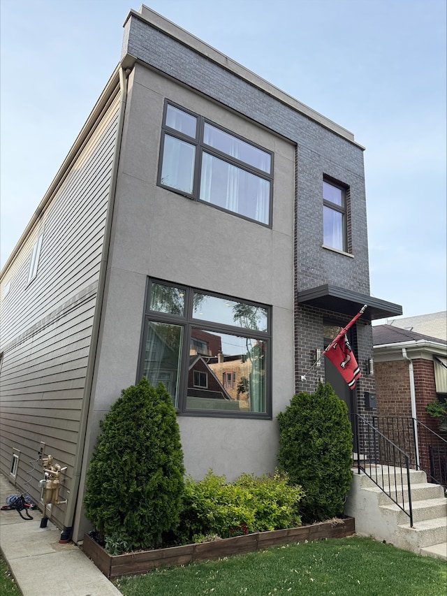 view of front of home with stucco siding