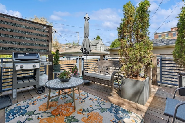deck featuring grilling area