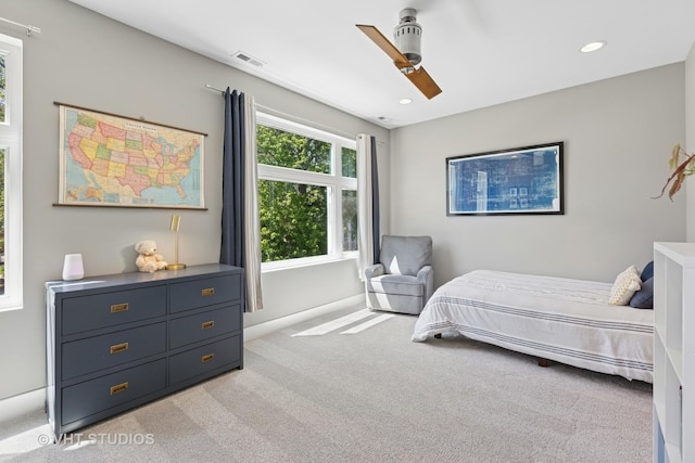 bedroom featuring light carpet, recessed lighting, and ceiling fan
