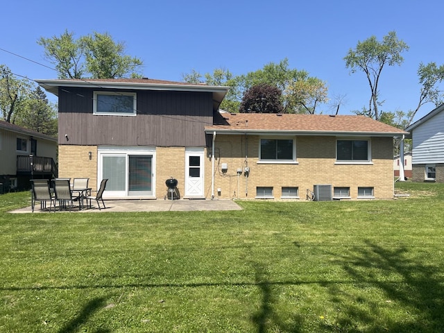 18840 May Ave, Homewood, IL 60430 - back of property featuring brick siding, a patio area, and a yard