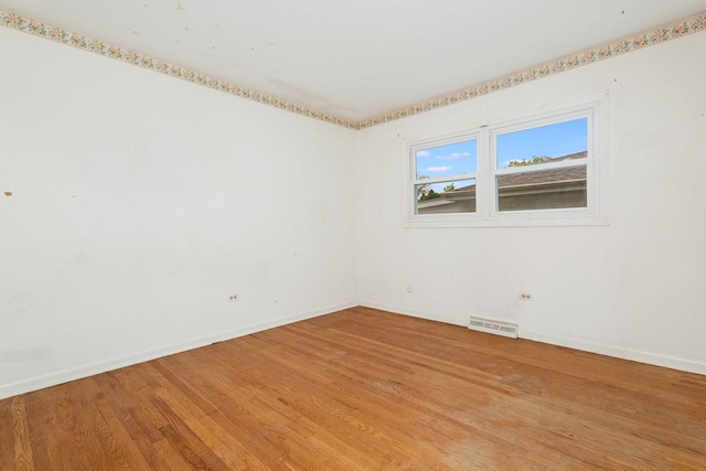 937 Twilight Ln, Wheeling, IL 60090 - unfurnished room with light wood-style flooring and baseboards
