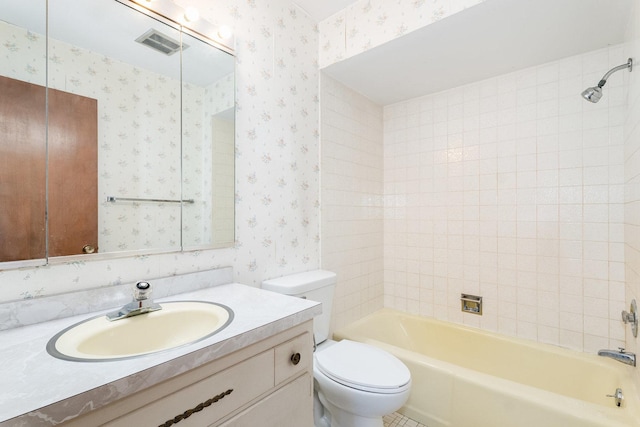 937 Twilight Ln, Wheeling, IL 60090 - full bathroom featuring wallpapered walls, toilet, vanity, and bathtub / shower combination