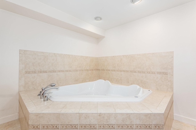 937 Twilight Ln, Wheeling, IL 60090 - bathroom with a garden tub and baseboards