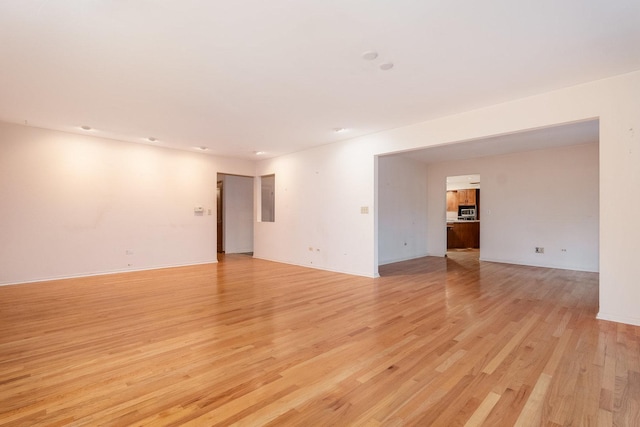 937 Twilight Ln, Wheeling, IL 60090 - spare room with light wood finished floors and baseboards