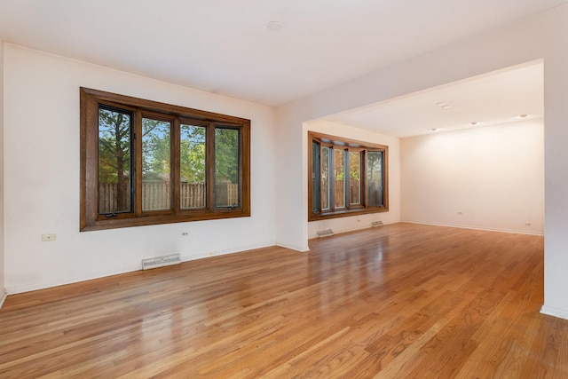 937 Twilight Ln, Wheeling, IL 60090 - spare room with light wood-style flooring and baseboards
