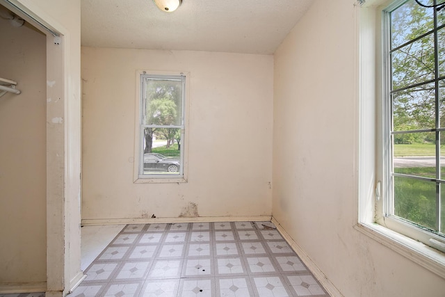 1990 Patrick Ave, Kankakee, IL 60901 - unfurnished room featuring light flooring and plenty of natural light