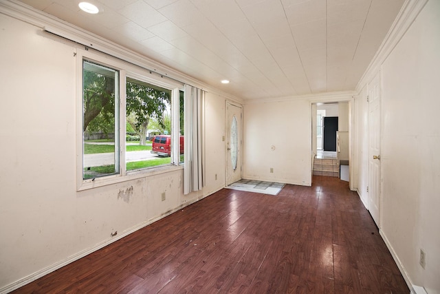 1990 Patrick Ave, Kankakee, IL 60901 - empty room featuring wood finished floors, ornamental molding, and baseboards