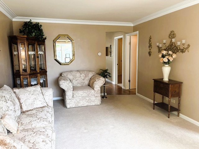 living room with carpet flooring, ornamental molding, baseboards, and a chandelier