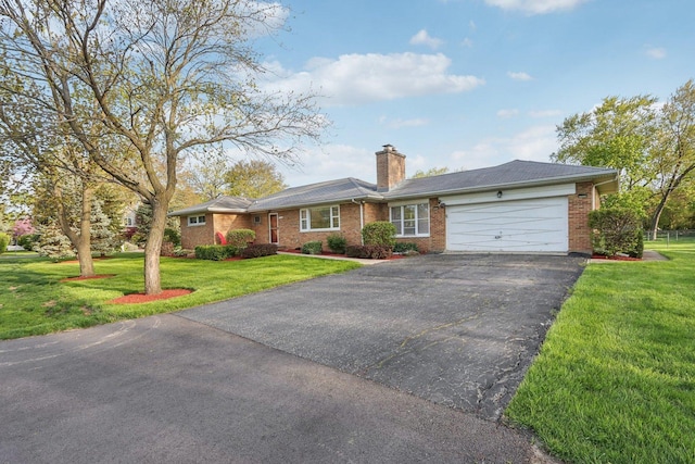 110 W Maude Ave, Arlington Heights, IL 60004 - ranch-style home with asphalt driveway, an attached garage, brick siding, a chimney, and a front yard