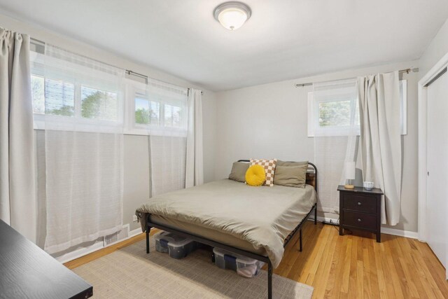 110 W Maude Ave, Arlington Heights, IL 60004 - bedroom with multiple windows and light wood-style flooring