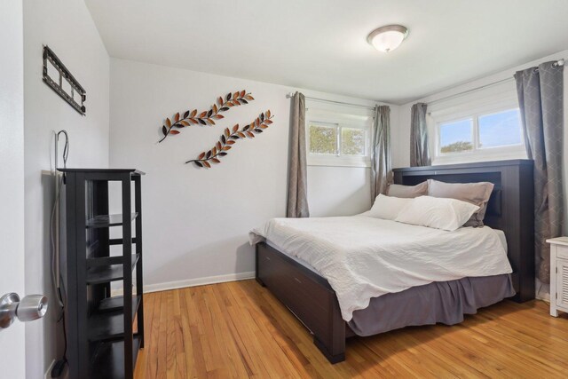 110 W Maude Ave, Arlington Heights, IL 60004 - bedroom with light wood-type flooring and baseboards