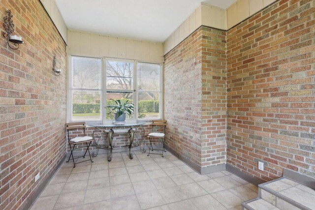 110 W Maude Ave, Arlington Heights, IL 60004 - sunroom with brick wall and tile patterned flooring