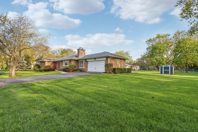 110 W Maude Ave, Arlington Heights, IL 60004 - single story home featuring asphalt driveway, brick siding, a storage shed, a garage, and a front lawn