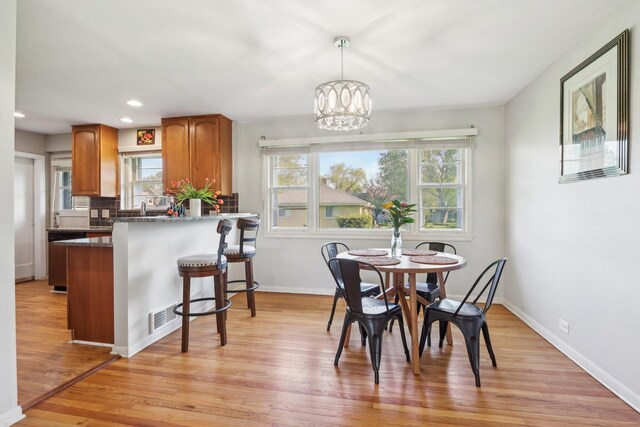 110 W Maude Ave, Arlington Heights, IL 60004 - dining room featuring light wood-style flooring, plenty of natural light, recessed lighting, baseboards, and a chandelier