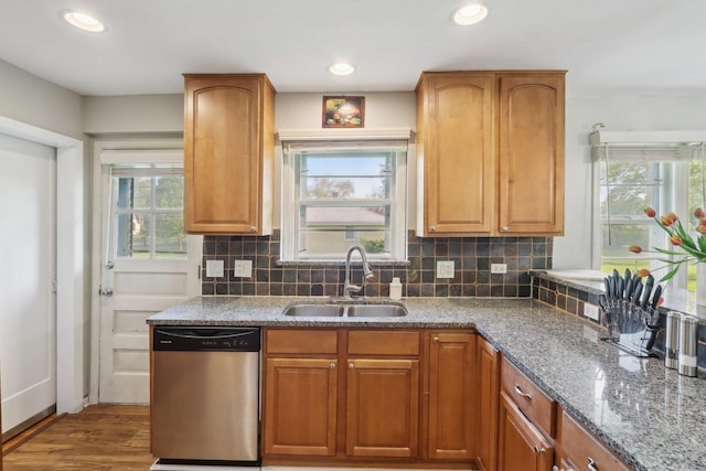 110 W Maude Ave, Arlington Heights, IL 60004 - kitchen with stainless steel dishwasher, a sink, stone countertops, backsplash, and recessed lighting