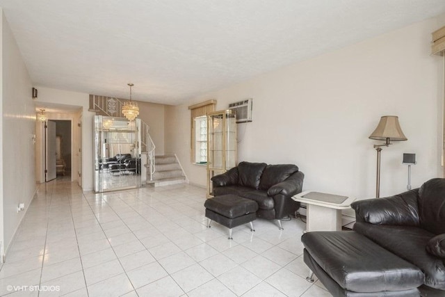 living area featuring light tile patterned floors, stairway, and a wall mounted air conditioner