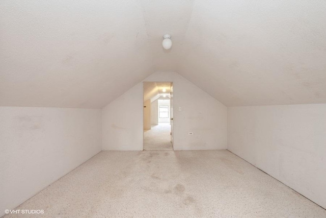 bonus room with lofted ceiling