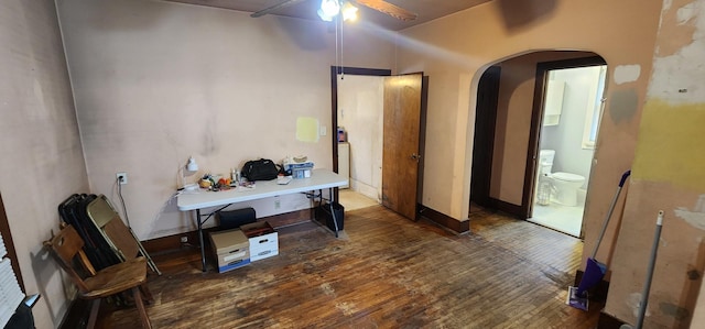 1128 N Hickory St, Joliet, IL 60435 - home office featuring arched walkways, a ceiling fan, and wood-type flooring