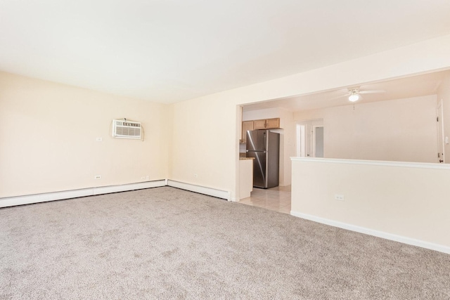 15302 Kenton Ave Unit 3, Oak Forest, IL 60452 - spare room featuring light colored carpet, a wall mounted AC, ceiling fan, and baseboards