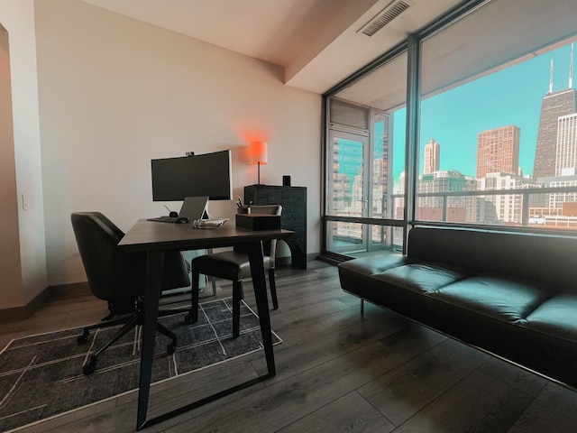 office area with wood finished floors and baseboards